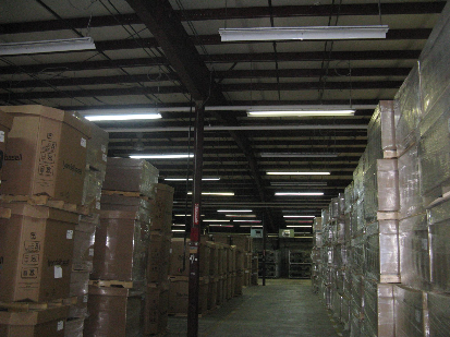 Warehouse aisle with material in dunnage.